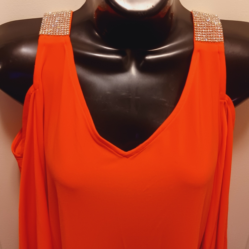 CB - Stylish coral dress in medium size, with rhinestone shoulder accents.